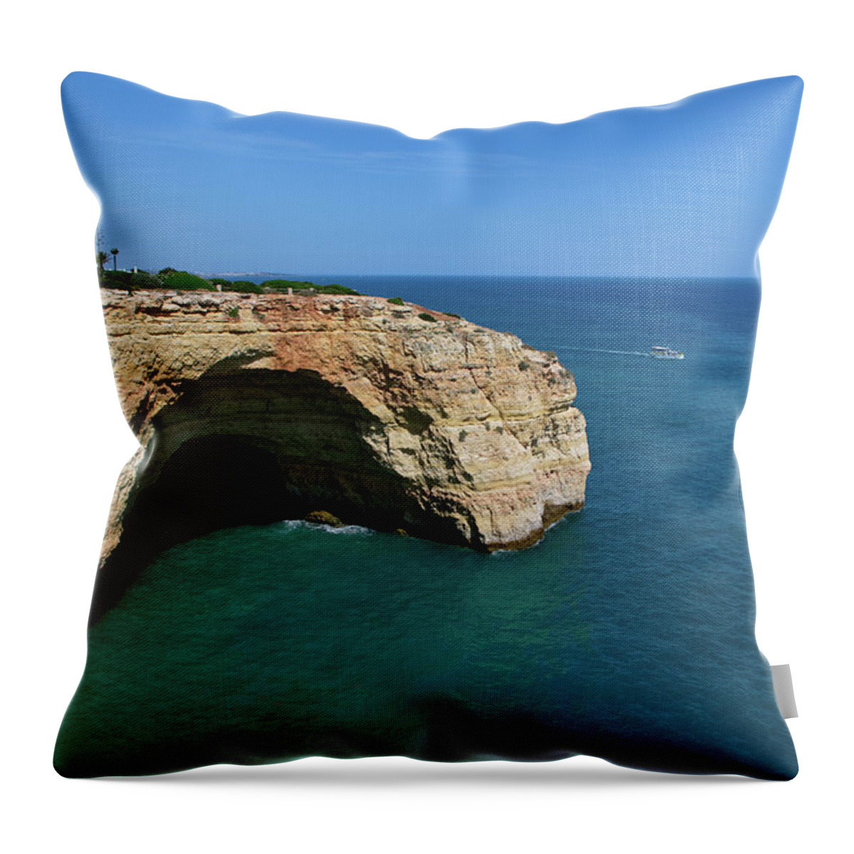 Algarve Throw Pillow featuring the photograph Monumental cliff formation in Lagoa by Angelo DeVal