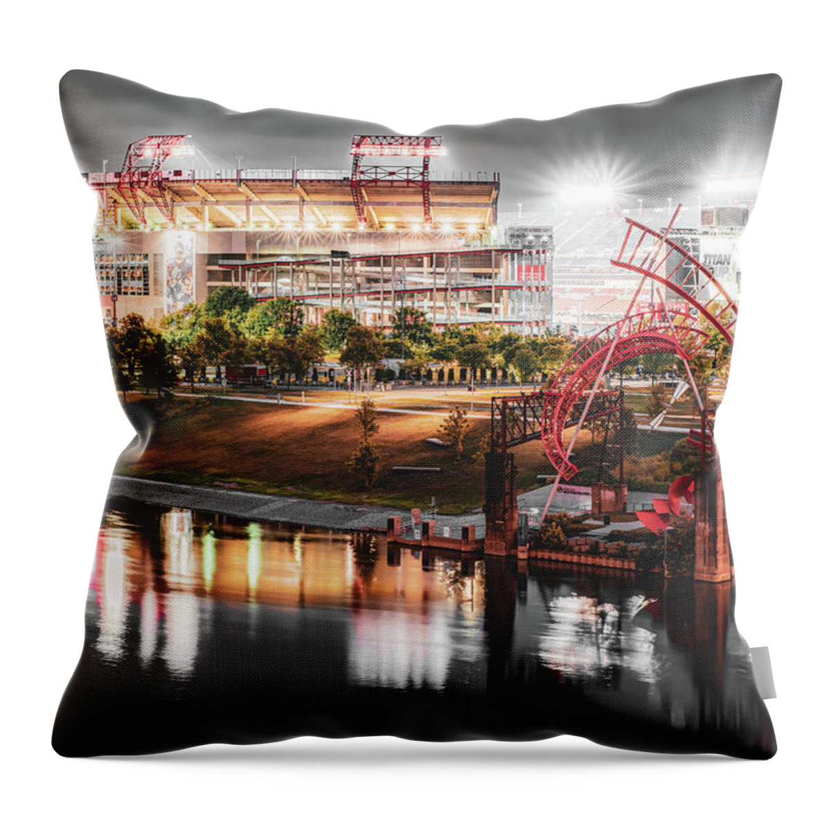 Tennessee Titans Throw Pillow featuring the photograph Nashville Tennessee Stadium Along The Cumberland River in Selective Color by Gregory Ballos