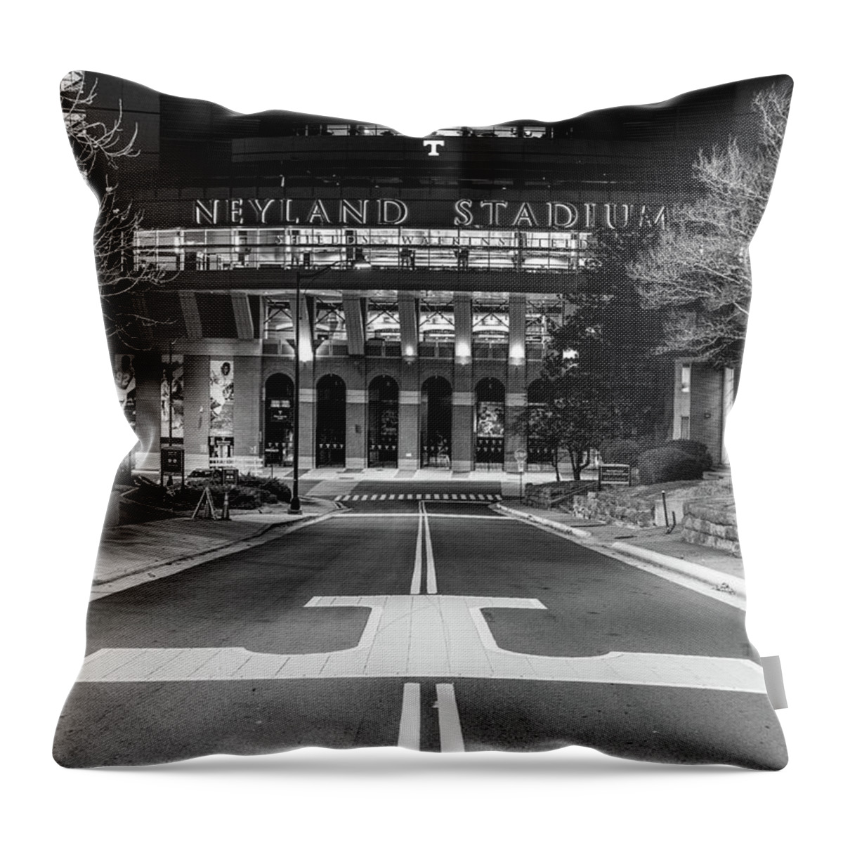 University Of Tennessee At Night Throw Pillow featuring the photograph Neyland Stadium at the University of Tennessee at night in black and white by Eldon McGraw