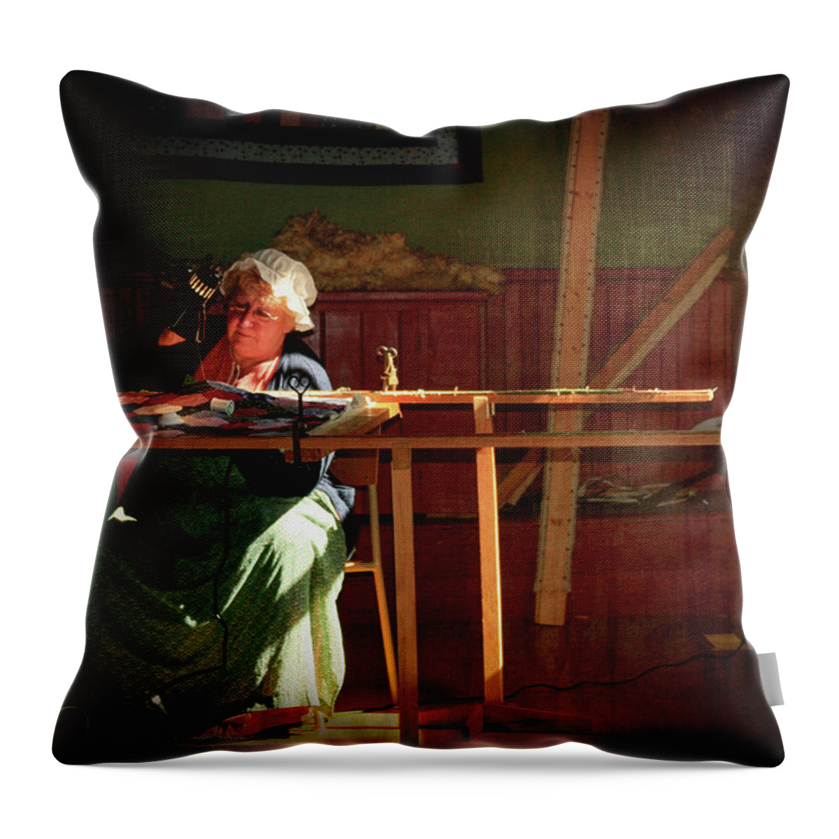 Quilt Maker Throw Pillow featuring the photograph Old time quilt maker in the window light by Tatiana Travelways