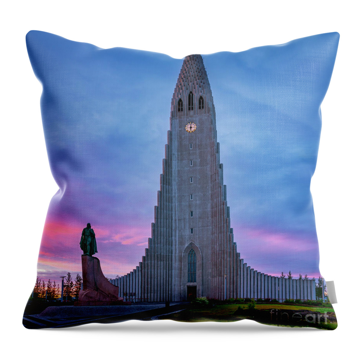Iceland Throw Pillow featuring the photograph Reykjavik Cathedral at sunrise by Izet Kapetanovic