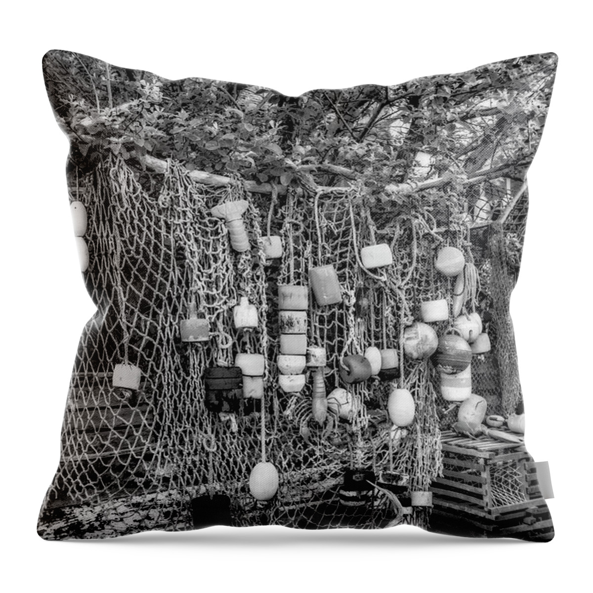Bradley Wharf Throw Pillow featuring the photograph Rockport Fishing Net And Buoys BW by Susan Candelario