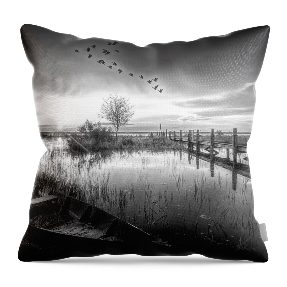 Birds Throw Pillow featuring the photograph Rowboat in the Marsh at Sunset in Black and White by Debra and Dave Vanderlaan