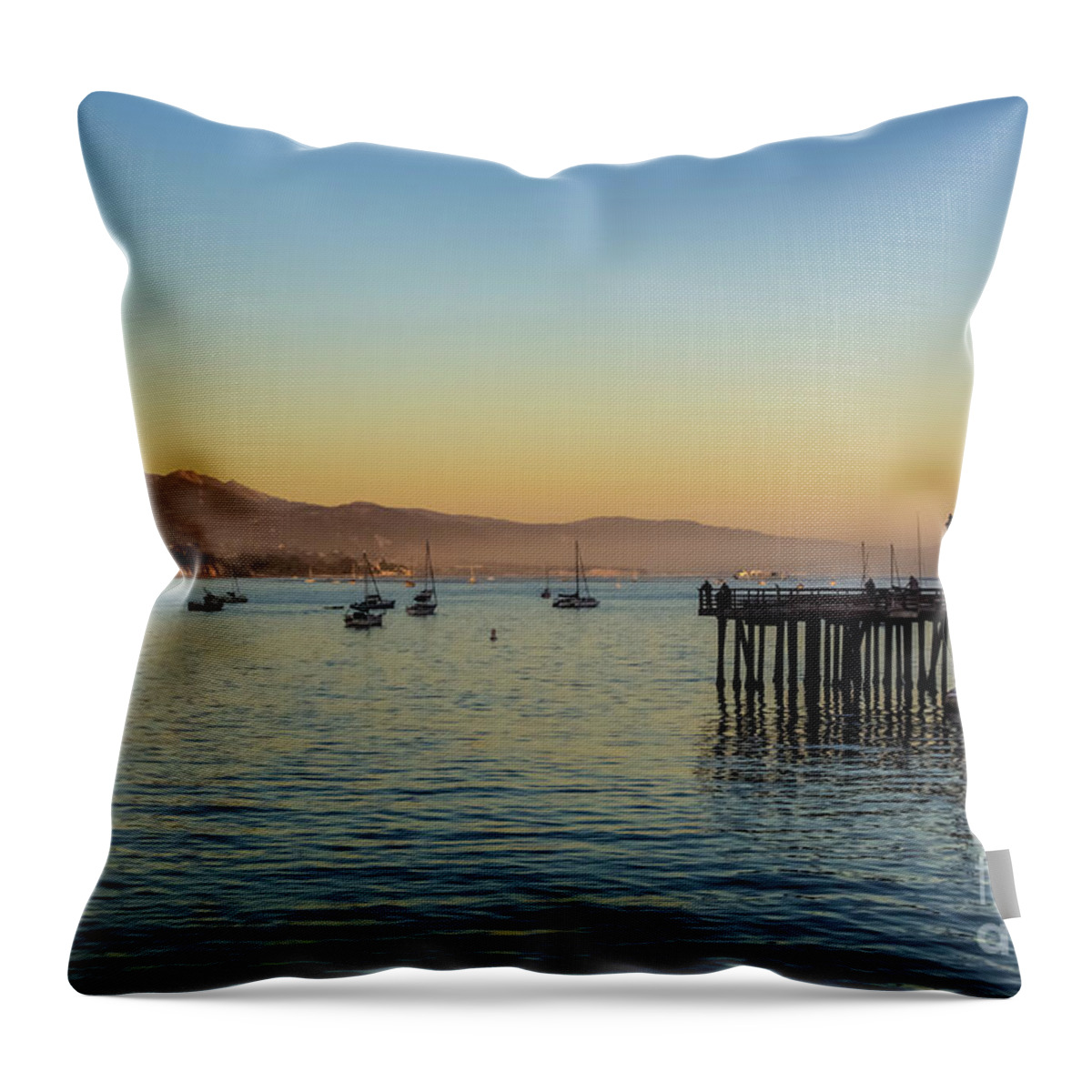 Sunset Throw Pillow featuring the photograph SB Wharf And Boats At Sunset by Suzanne Luft