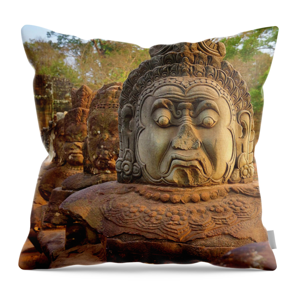 Cambodia Throw Pillow featuring the photograph Stone carved statues of Devas in Cambodia by Mikhail Kokhanchikov