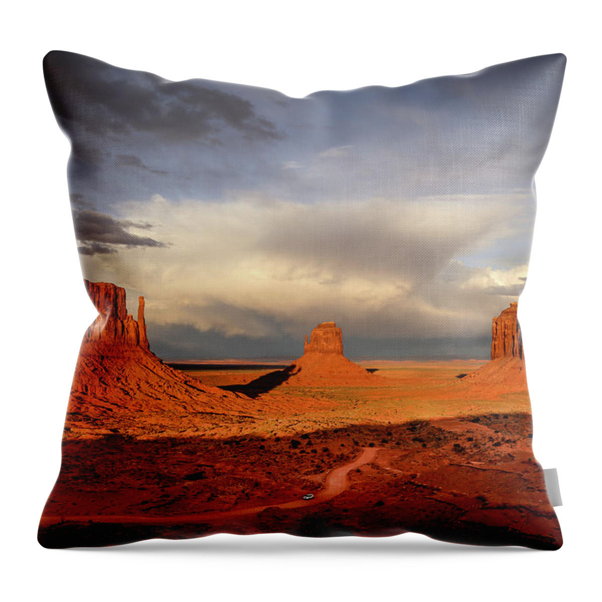 Monument Valley Throw Pillow featuring the photograph Storm At Sunset At Monument Valley by Alberto Zanoni