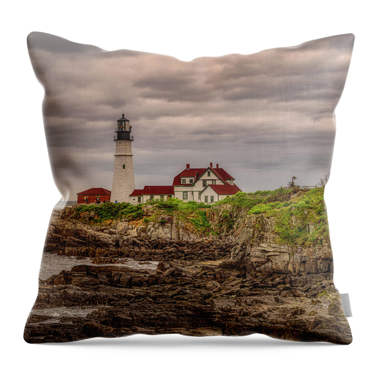 Portland Head Light Throw Pillow featuring the photograph Stormy Skies at Portland Head Light by Penny Polakoff