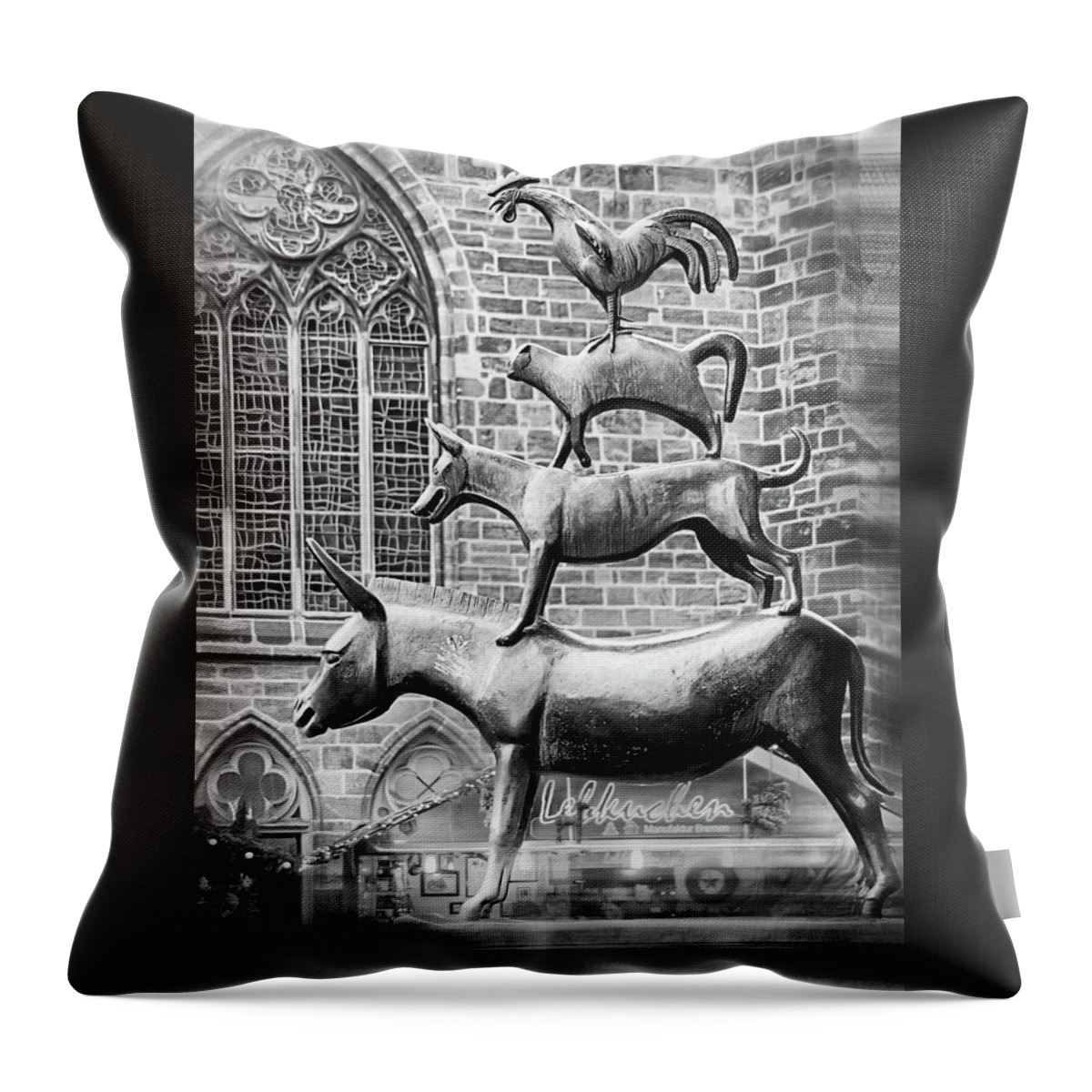 The Bremen Town Musicians Throw Pillow featuring the photograph The Bremen Town Musicians Bremen Germany Black and White by Carol Japp