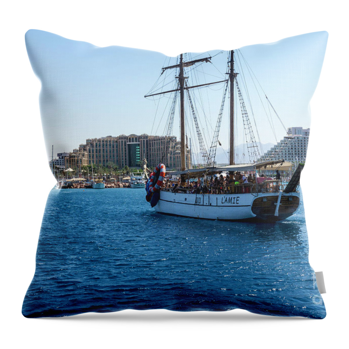 Gulf Of Aqaba Throw Pillow featuring the photograph The excursion boat L'Amie cruises in the Gulf of Aqaba off the r by William Kuta
