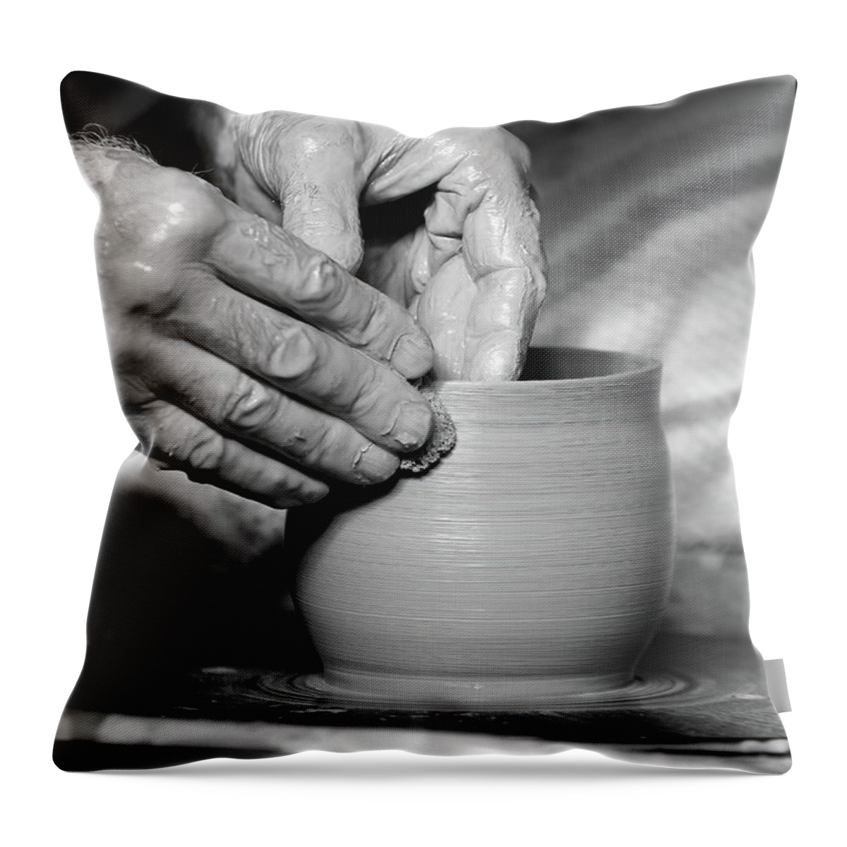 Ceramic Throw Pillow featuring the photograph The Potter's Hands bw by Lens Art Photography By Larry Trager