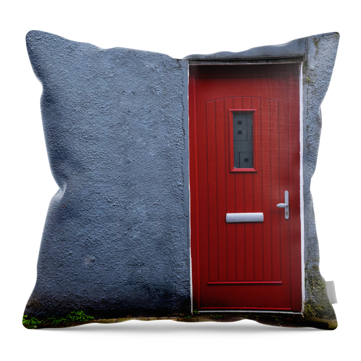 Red Door Throw Pillow featuring the photograph Traditional English house facade front entrance with red closed door . by Michalakis Ppalis