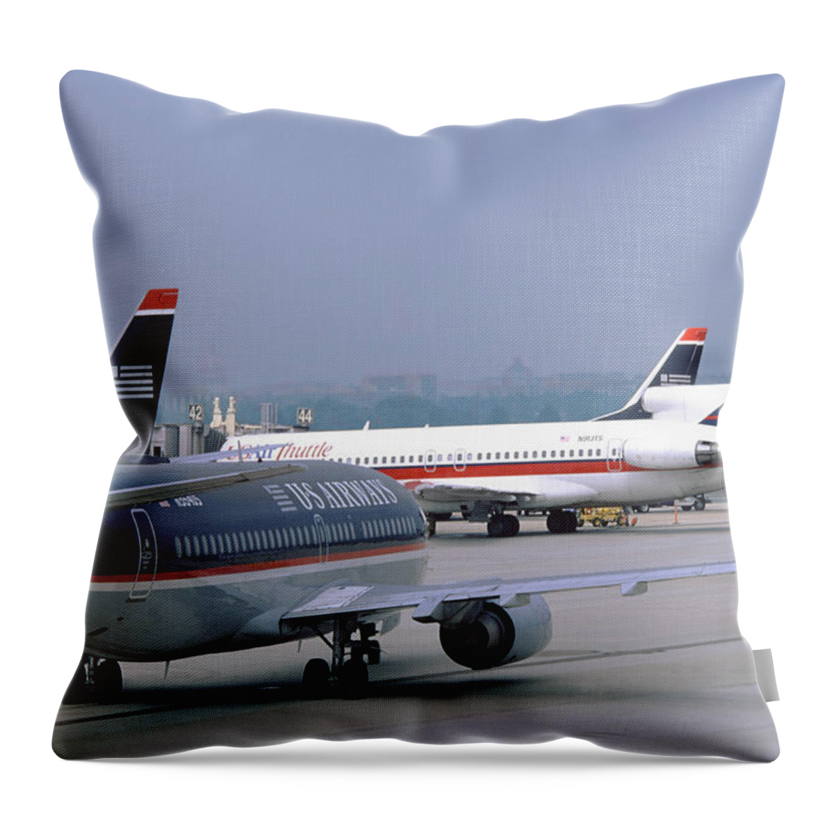 Us Airways Throw Pillow featuring the photograph US Airways Boeing 737s at Washington Reagan Airport by Erik Simonsen
