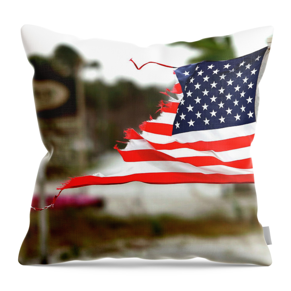 Hurricane Throw Pillow featuring the photograph U.S. Flag damaged by Hurricane by Rick Wilking