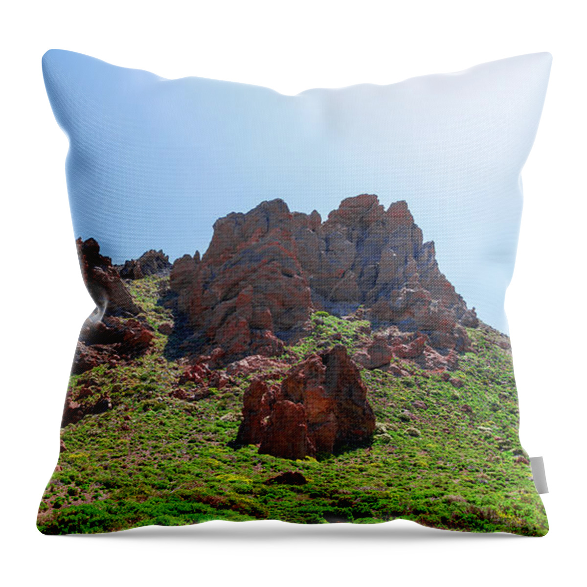 Mountains Throw Pillow featuring the photograph Vegetation surrounding red lava rocks by Sun Travels