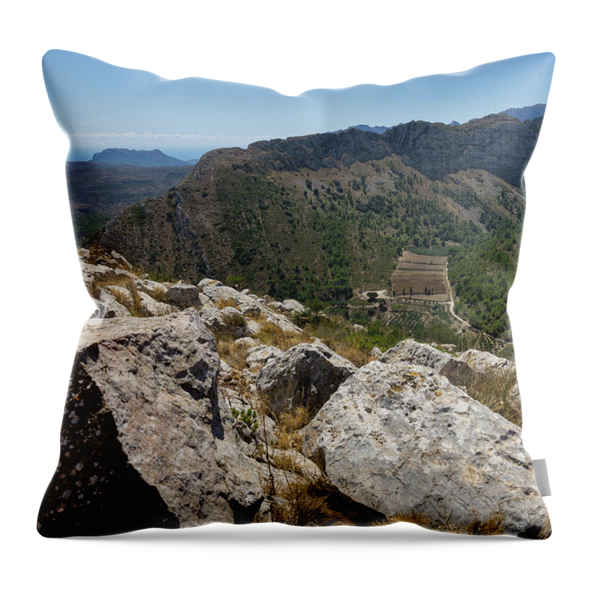 Mountains Throw Pillow featuring the photograph Mountain range and rocks on the Mediterranean coast by Adriana Mueller