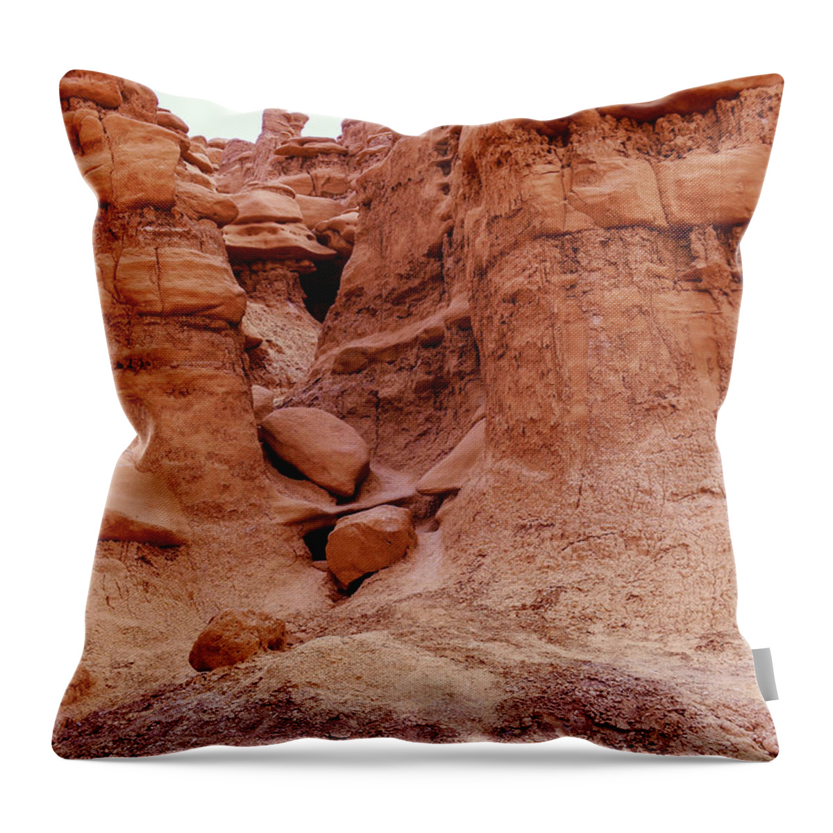 Goblin Valley Throw Pillow featuring the photograph Walking in goblin valley by Jeff Swan