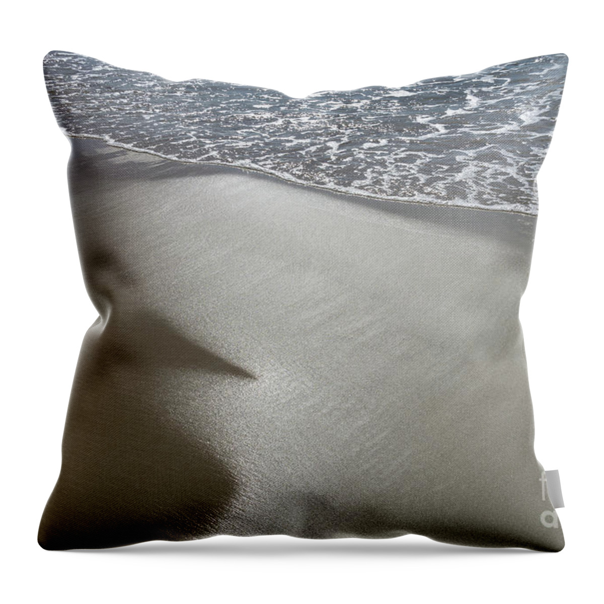 Sandy Beach Throw Pillow featuring the photograph Wet sand, sea water and reflections of sunlight by Adriana Mueller