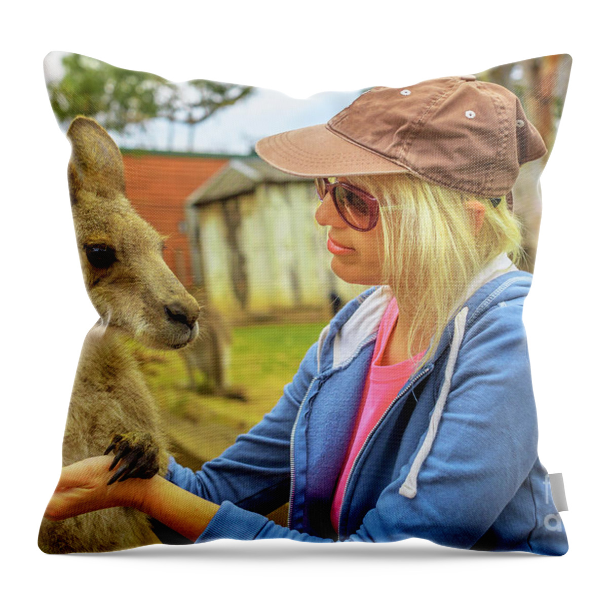 Kangaroos Throw Pillow featuring the photograph Woman with kangaroo by Benny Marty