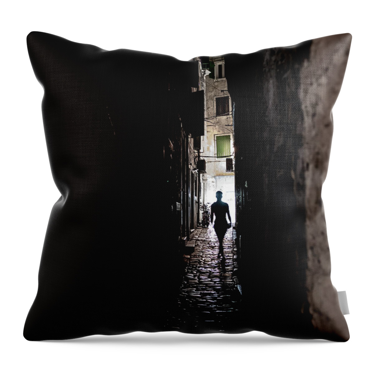  Throw Pillow featuring the photograph Young Woman Walks Alone Through Spooky Narrow Abandoned Alley In The Night by Andreas Berthold