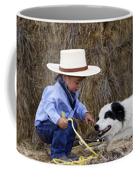 Boy Coffee Mug featuring the photograph Cowboy With Border Collie #1 by M. Watson