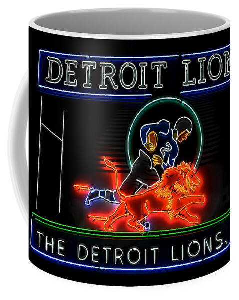 https://render.fineartamerica.com/images/rendered/default/frontright/mug/images-medium-5/1-detroit-lions-football-frozen-in-time-fine-art-photography.jpg?&targetx=150&targety=0&imagewidth=499&imageheight=333&modelwidth=800&modelheight=333&backgroundcolor=06050A&orientation=0&producttype=coffeemug-11