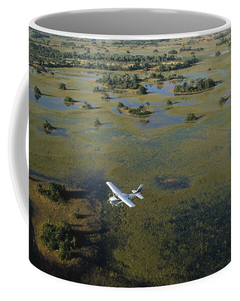 Feb0514 Coffee Mug featuring the photograph Flight Safari Okavango Delta Botswana #1 by Konrad Wothe