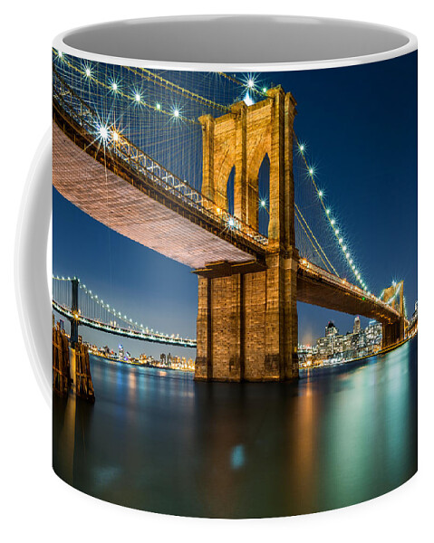 Architecture Coffee Mug featuring the photograph Illuminated Brooklyn Bridge by night #1 by Mihai Andritoiu