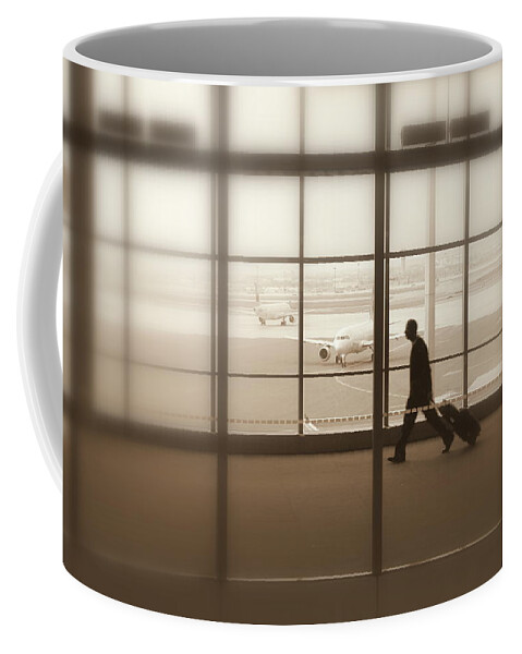 Lone Coffee Mug featuring the photograph Lone Traveler #3 by Valentino Visentini