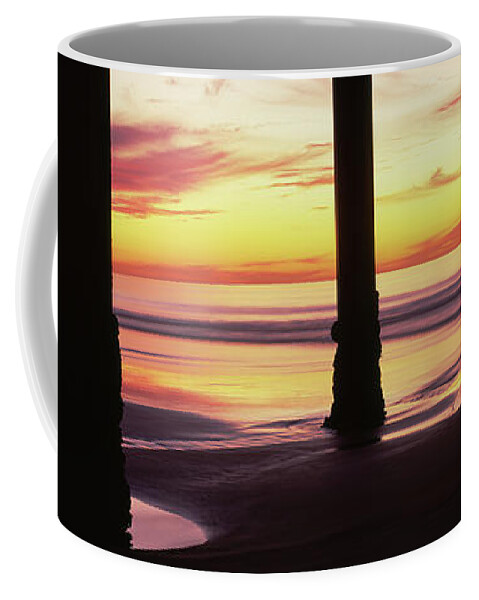 Photography Coffee Mug featuring the photograph Silhouette Of A Pier In The Pacific #1 by Panoramic Images