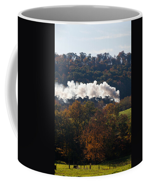 Antique Coffee Mug featuring the photograph Steam train powers along railway #1 by Steven Heap
