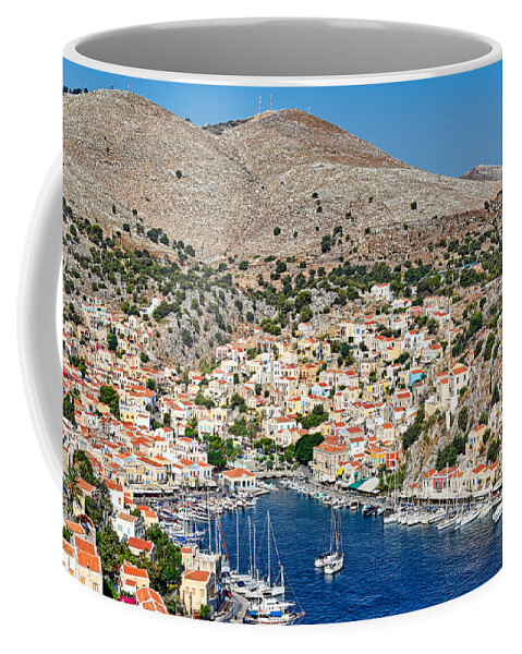 Aegean Coffee Mug featuring the photograph The port of Symi - Greece #1 by Constantinos Iliopoulos