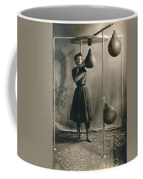 1890 Coffee Mug featuring the photograph Woman Boxing Workout #2 by Underwood Archives