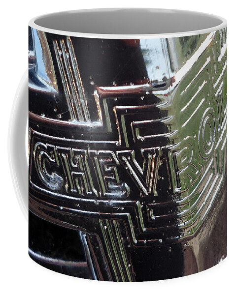 Skompski Coffee Mug featuring the photograph 1938 Chevrolet Sedan Emblem by Joseph Skompski