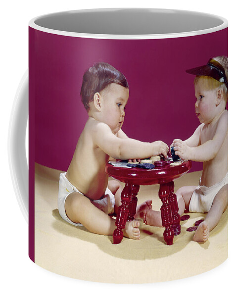 Photography Coffee Mug featuring the photograph 1960s Two Babies Sitting At Red Stool by Vintage Images
