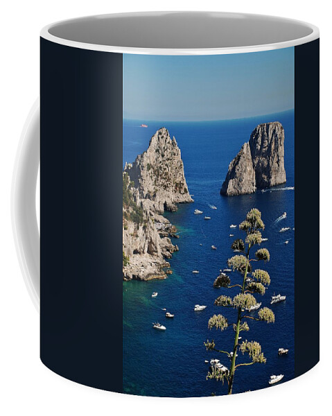 Capri Coffee Mug featuring the photograph Faraglioni in Capri #1 by Dany Lison