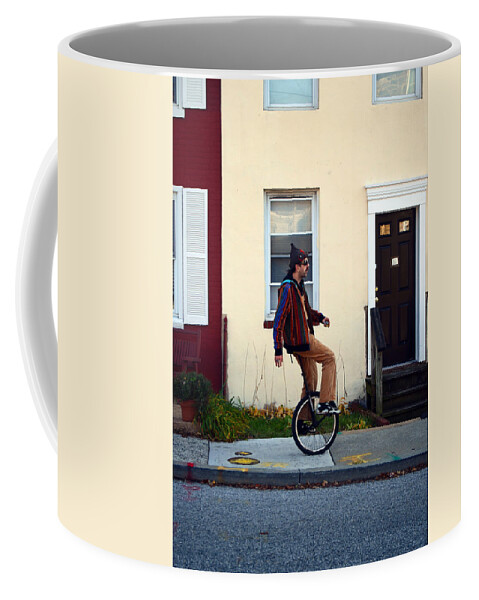 Baltimore Coffee Mug featuring the photograph A Lesson in Unicycle by La Dolce Vita