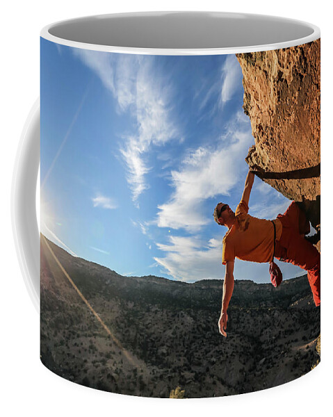 A Rock Climber Hangs From One Hand Coffee Mug by Bud Force - Fine Art  America