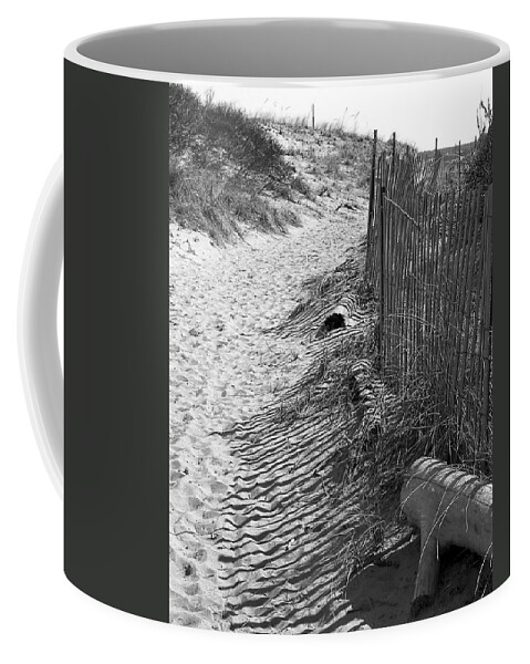 Beach Retaining Fence Coffee Mug featuring the photograph A Stroll In The Sand by Jeff Folger