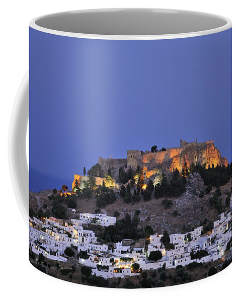 Rhodes Coffee Mug featuring the photograph Acropolis and village of Lindos during dusk time by George Atsametakis