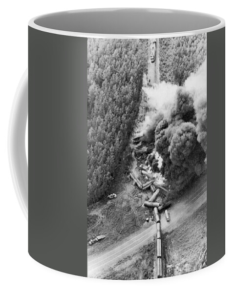 1970's Coffee Mug featuring the photograph Alaskan Train Wreck by Underwood Archives