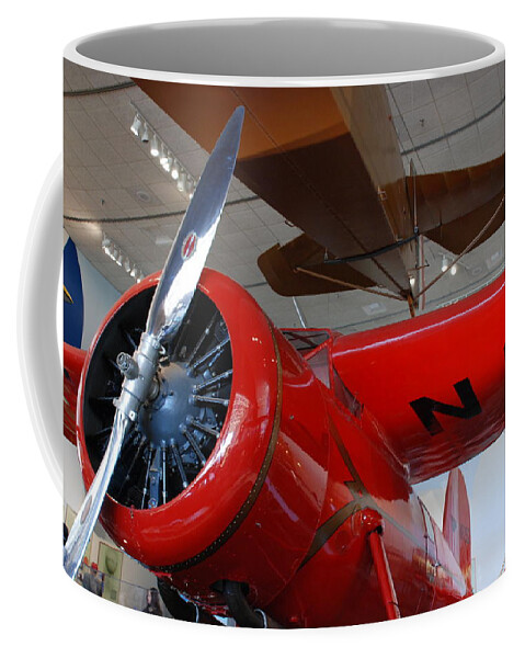 Amelia Earhart Coffee Mug featuring the photograph Amelia Earhart Prop Plane by Kenny Glover