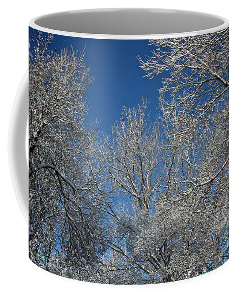 Trees Coffee Mug featuring the photograph April Skies by Susan Herber