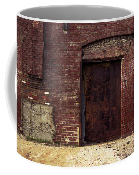 Rust Coffee Mug featuring the photograph Arch With Steel Door by Greg Kluempers