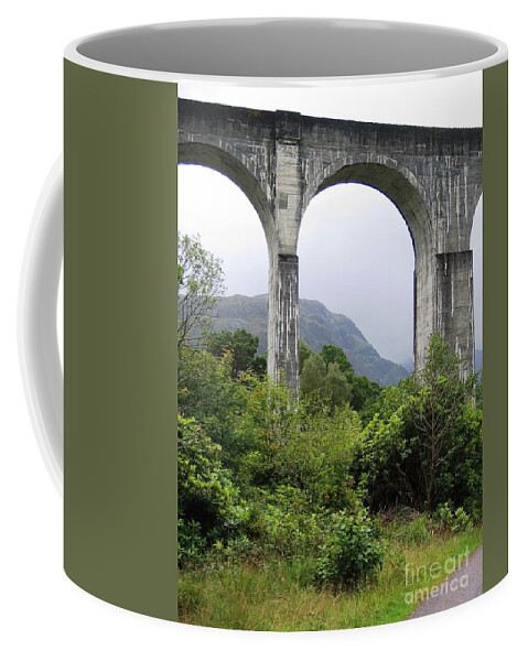 Scottish Highlands Coffee Mug featuring the photograph Arches by Denise Railey