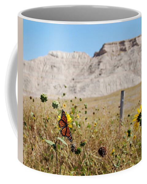Dakota Coffee Mug featuring the photograph Badlands Butterfly by Greni Graph