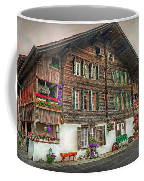 Switzerland Coffee Mug featuring the photograph Bernese wooden House by Hanny Heim