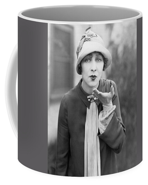 1920 Coffee Mug featuring the photograph Blowing A Kiss by Underwood Archives