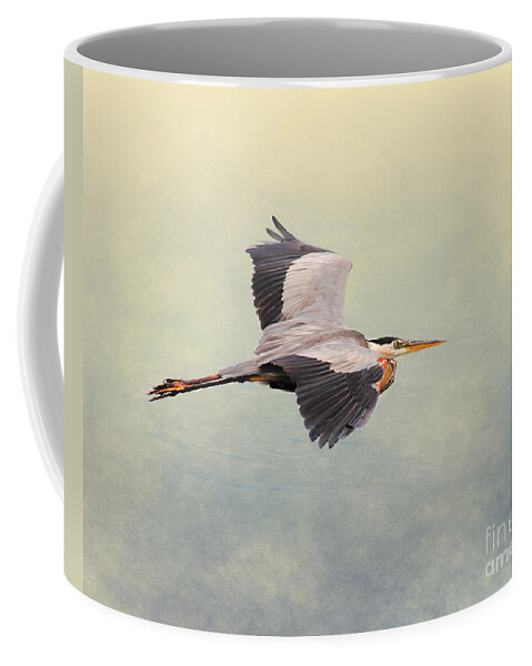 Blue Heron Coffee Mug featuring the photograph Blue Heron in Flight by Jai Johnson