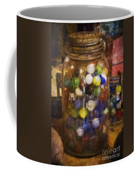 Marbles Coffee Mug featuring the photograph Bottle of Youth by Carrie Cranwill