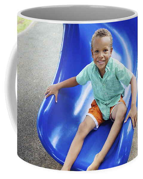 Blue Coffee Mug featuring the photograph Boy on Slide by Kicka Witte